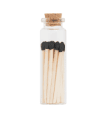 Petite glass jar with black-tipped wooden matches and cork lid for safe storage.