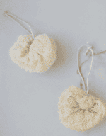 Soft, natural exfoliating body scrubbers with adjustable cords for gentle skincare routines. Perfect.