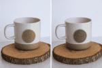 Nurtured Collective ceramic mug with logo on a wooden coaster, minimalistic design.