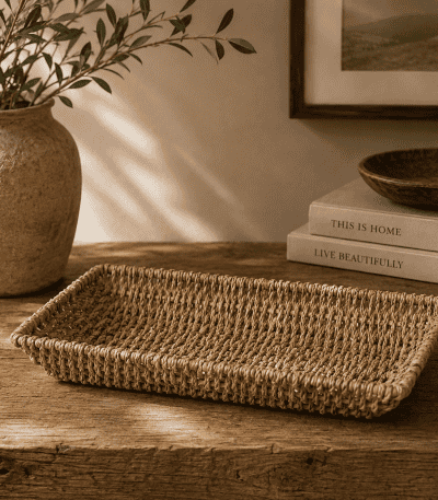 Handwoven natural wicker tray for home decor and organization.