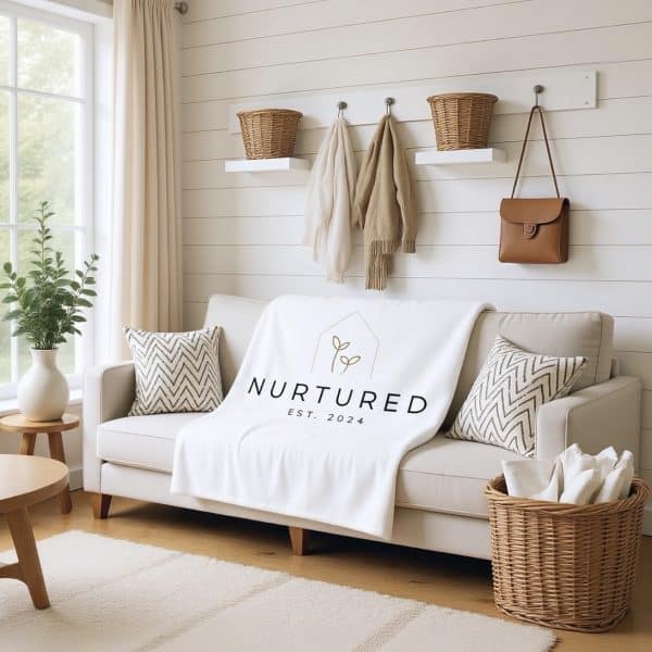 Cozy living room with Nurtured Collective blanket and natural decor elements.
