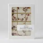 Aromatherapy soy beeswax melt with rose sandalwood scent in a white box.