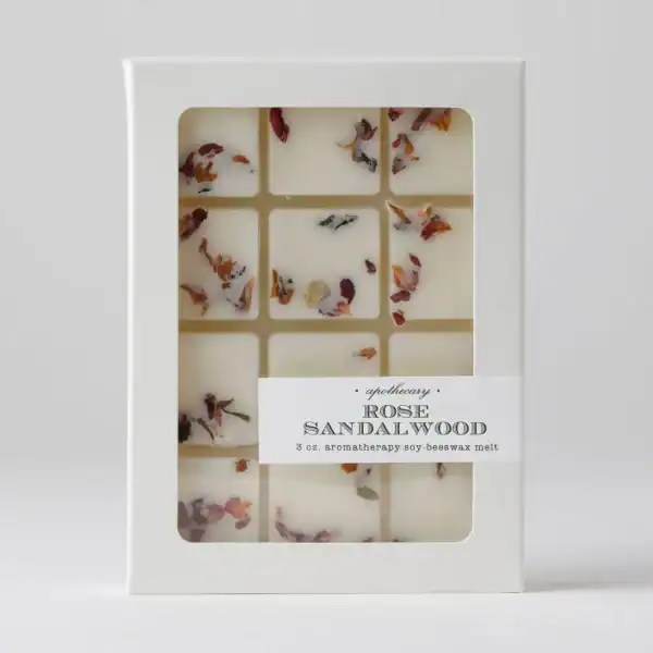 Aromatherapy soy beeswax melt with rose sandalwood scent in a white box.