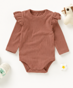 Organic cotton baby bodysuit in Heirloom Rose with flutter sleeves, long sleeves, and ribbed knit fabric.