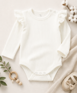 Organic cotton baby bodysuit in Soft Ivory with flutter sleeves, long sleeves, and ribbed knit texture.