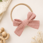 Willow Bow Organic Cotton Baby Headband in Blush Petal with soft muslin bow and comfortable stretch band