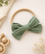 Willow Bow Organic Cotton Baby Headband in Blush Petal with soft muslin bow and comfortable stretch band